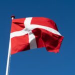 red and white flag on pole