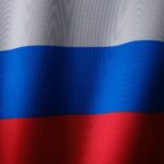 a close up of a red, white and blue flag